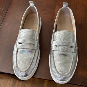 Silver Vionic Uptown loafers.